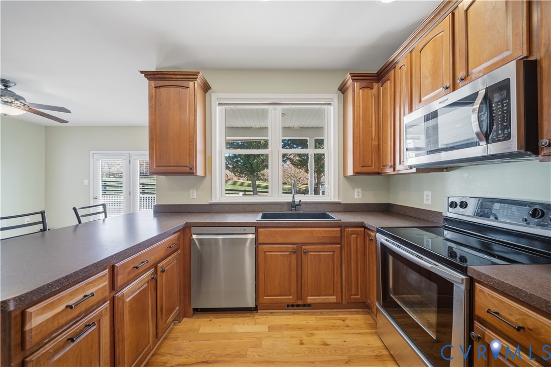 5815 Springfield Farm Lane Mineral, VA 23117 - Photo 3 of 41 Kitchen featuring stainless steel appliances, dark