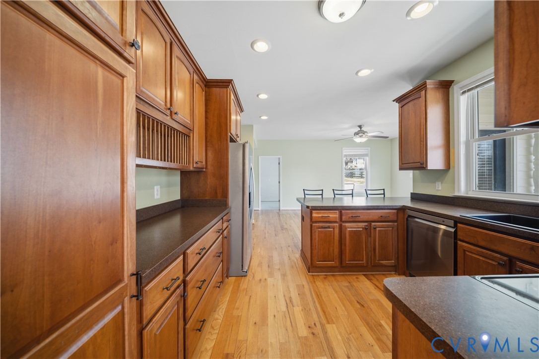 5815 Springfield Farm Lane Mineral, VA 23117 - Photo 4 of 41 Kitchen featuring dark countertops, wood finish ca