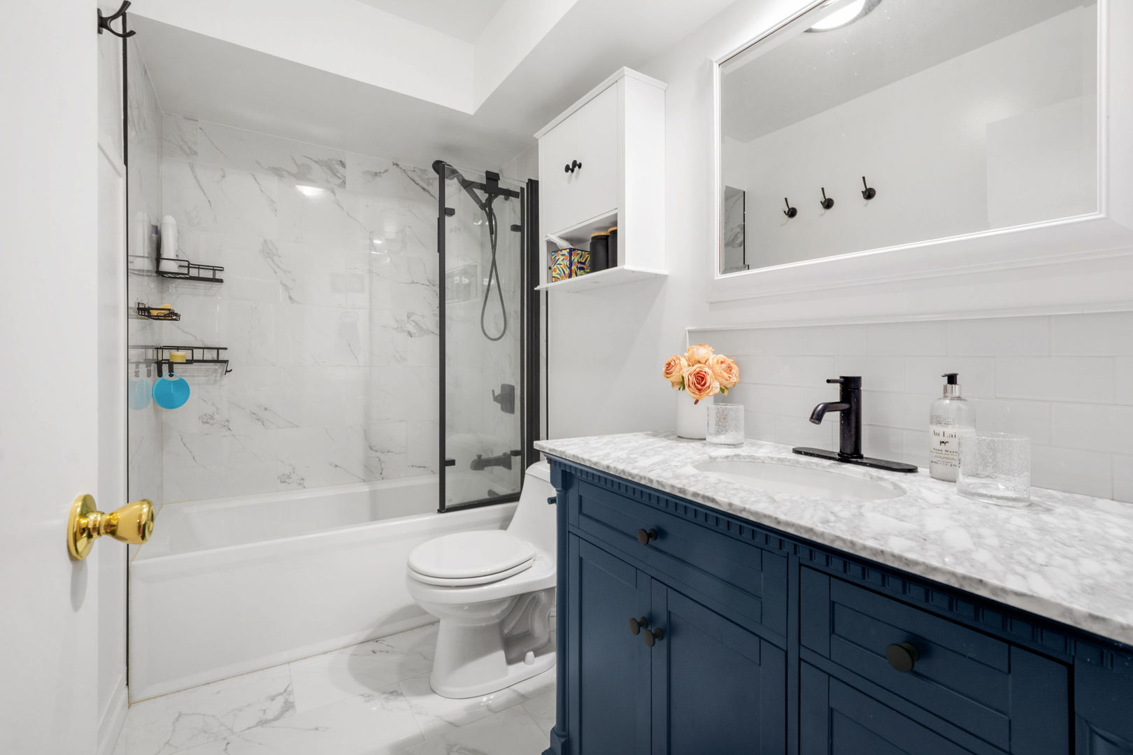 2141 Ridge Avenue, Unit 2B Evanston, IL 60201 - Photo 8 of 13 a bathroom with a granite countertop sink a toilet and shower