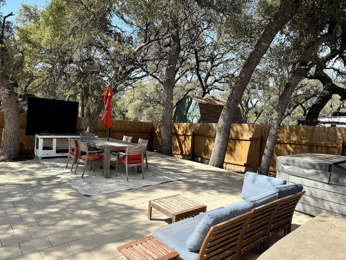 11605 Fitzhugh Road Austin, TX 78736 - Photo 6 of 24 a view of a backyard with sitting area