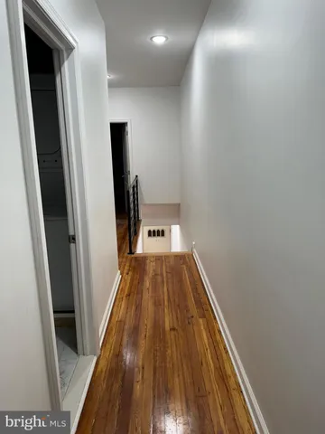 a view of a hallway from a hallway