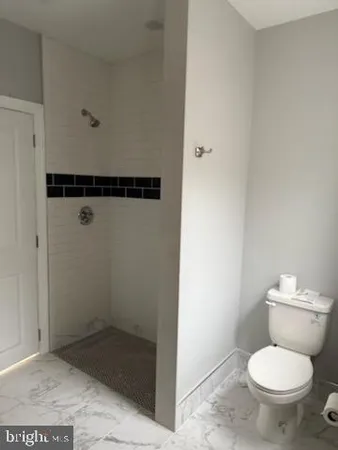 a bathroom with a toilet