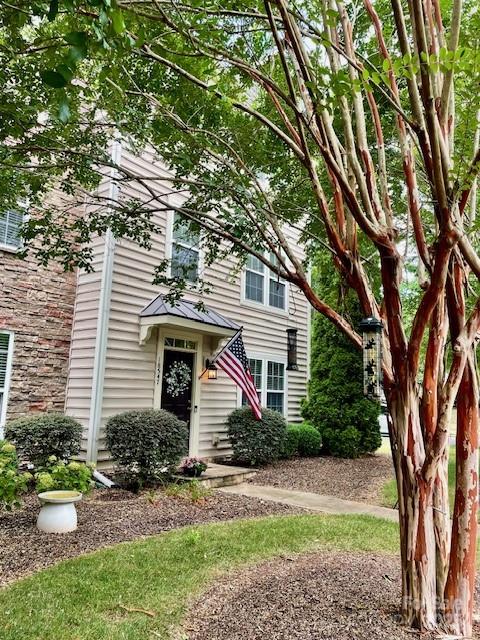 18547 The Commons Boulevard Cornelius, NC 28031 - Photo 2 of 33 a front view of a house with garden