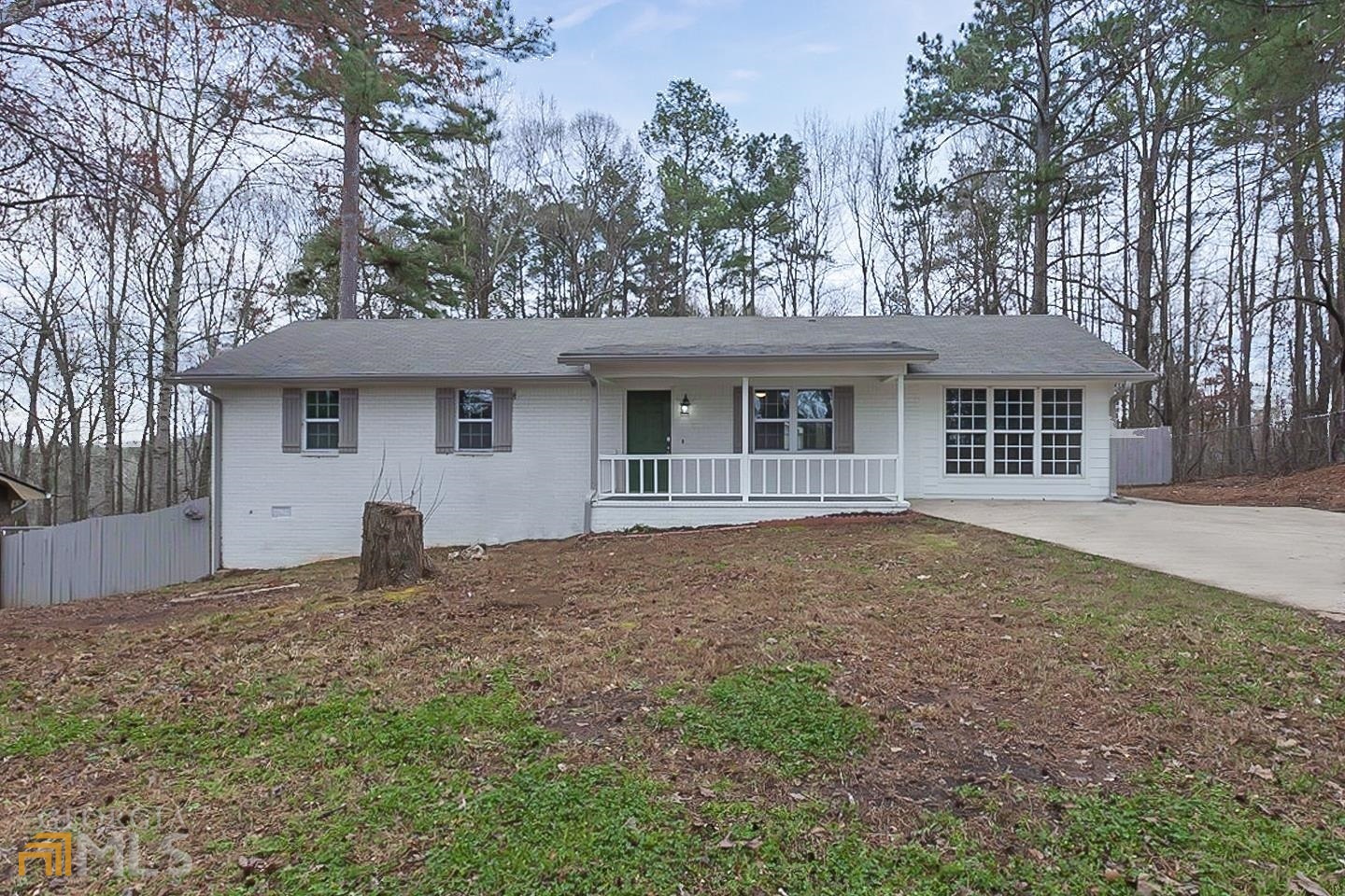 1884 Winndale Road Dallas, GA 30157 - Photo 1 of 1 a front view of a house with a garden