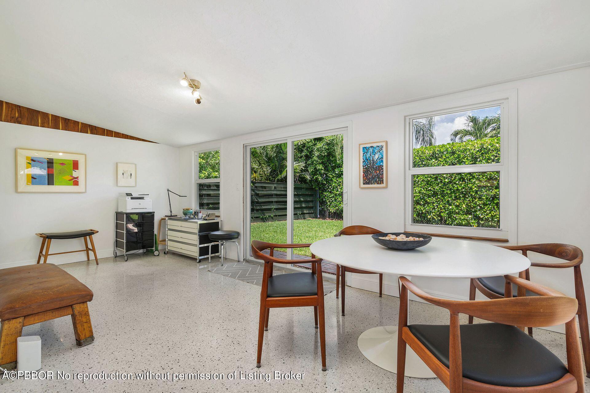 173 Arlington Road West Palm Beach, FL 33405 - Photo 16 of 27 a view of a dining room with furniture window and outside view