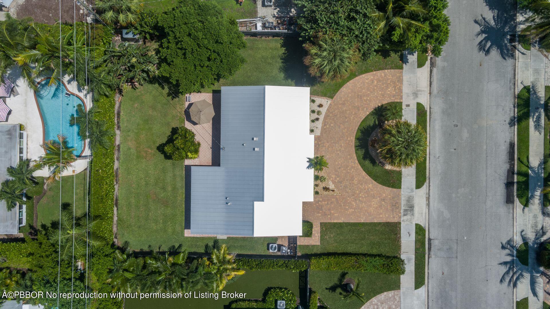 173 Arlington Road West Palm Beach, FL 33405 - Photo 2 of 27 an aerial view of a house with a garden