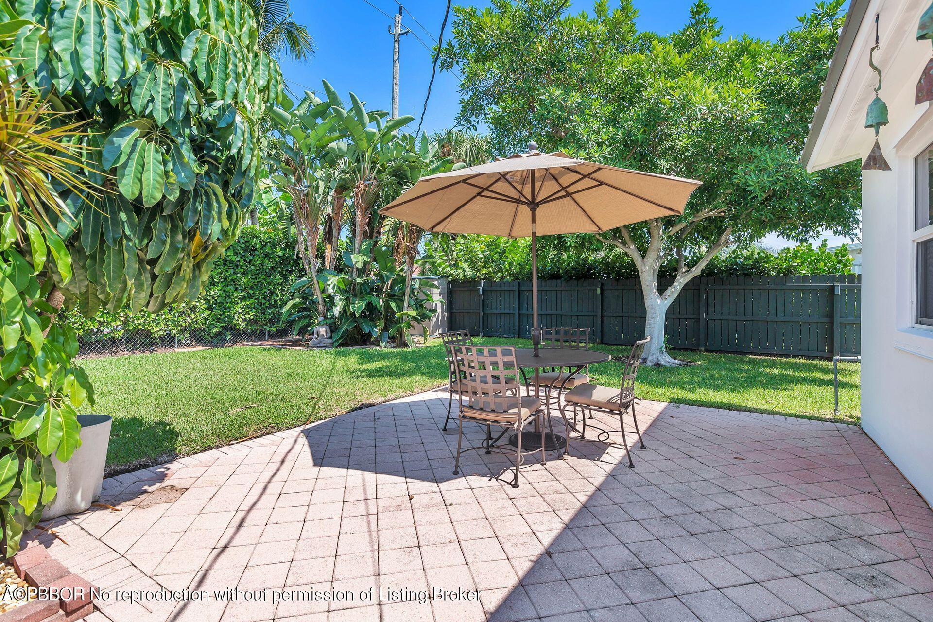173 Arlington Road West Palm Beach, FL 33405 - Photo 22 of 27 a view of a backyard with a sitting area