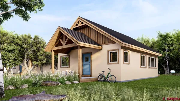 a backyard of a house with potted plants and large tree