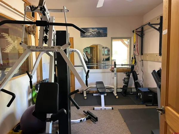 a view of a room with gym equipment