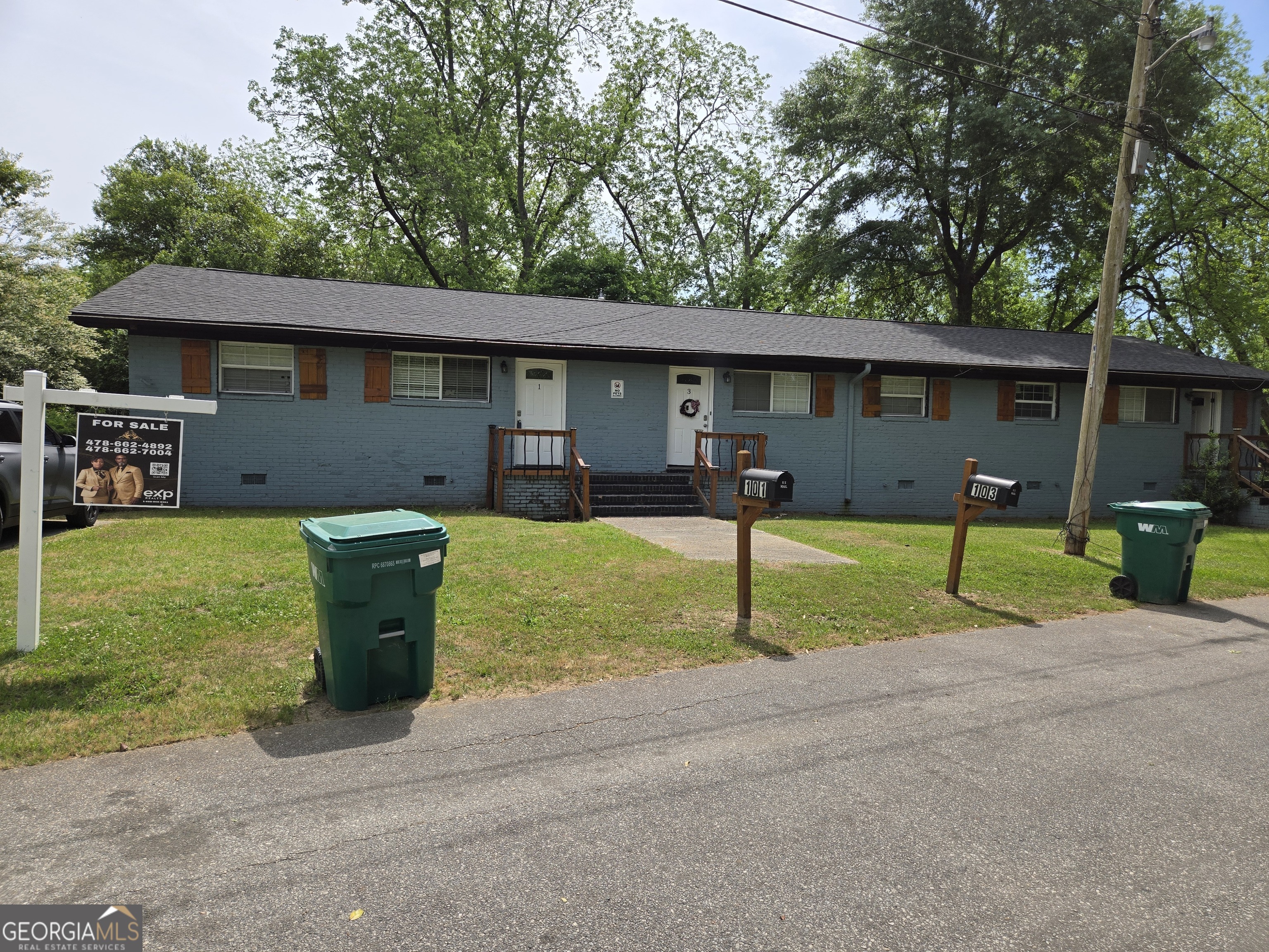 101 King Street Fort Valley, GA 31030 - Photo 2 of 17 a view of a house with backyard and a tree