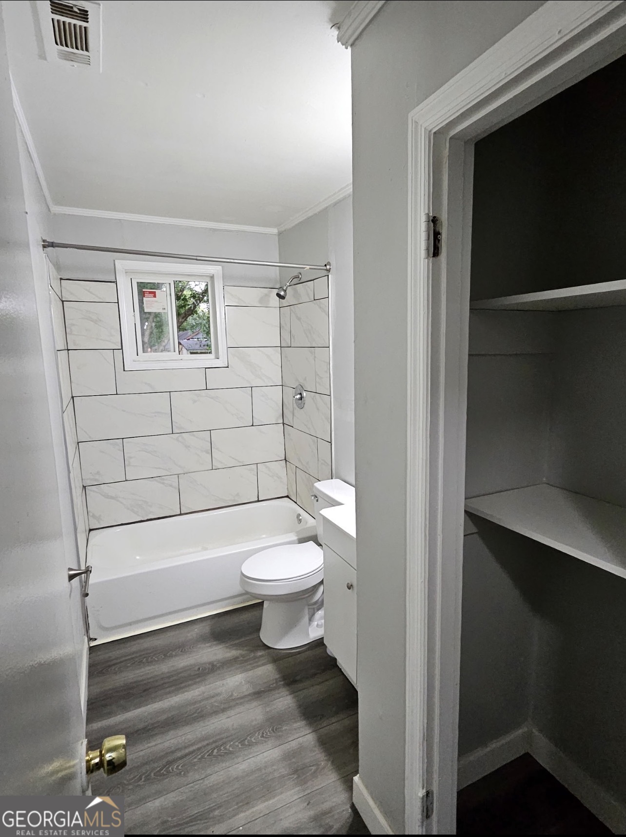 101 King Street Fort Valley, GA 31030 - Photo 3 of 17 a bathroom with a toilet and a shower