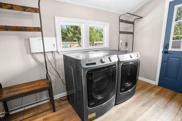 a utility room with dryer and washer