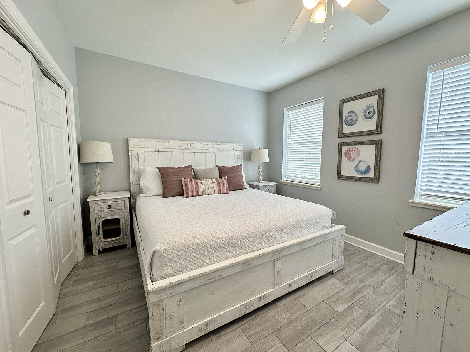 83 Sunfish Street Destin, FL 32541 - Photo 49 of 56 a large bed sitting in a bedroom next to a window