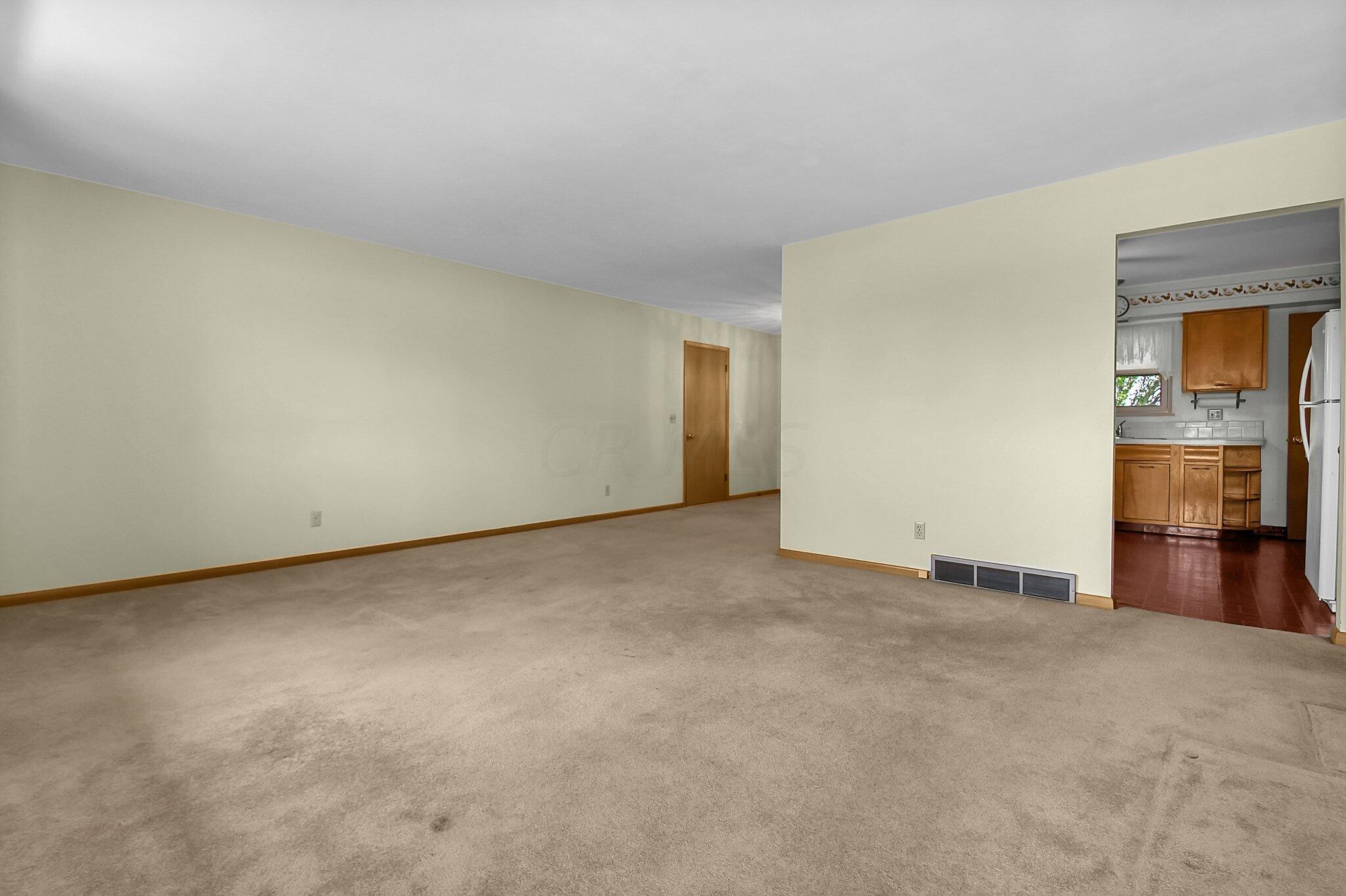 429 Amity Road Galloway, OH 43119 - Photo 6 of 27 Carpeting, however, underneath is hardwood floors.