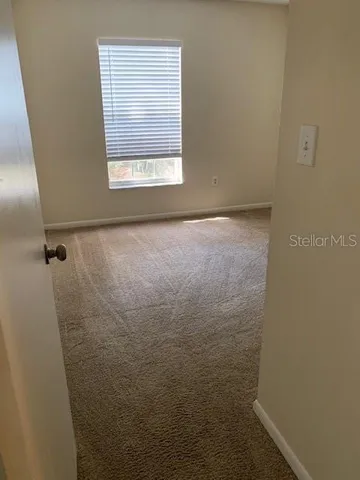 a view of a bathroom with a window