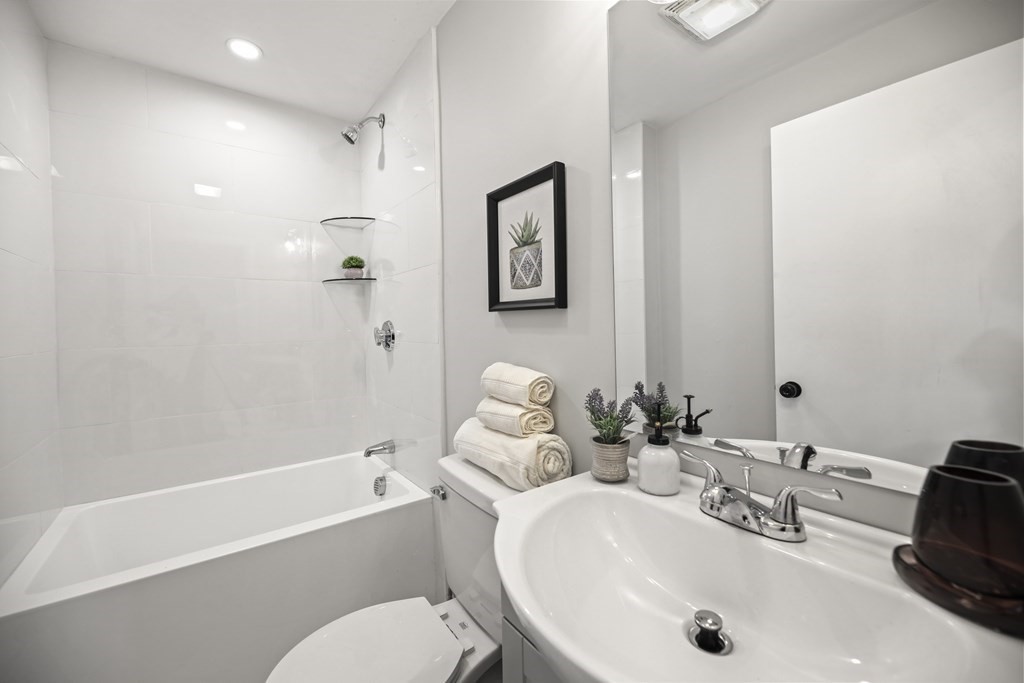 40 Como Road Boston, MA 02136 - Photo 12 of 31 a bathroom with a sink and a bathtub