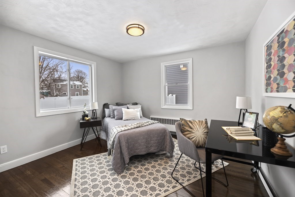 40 Como Road Boston, MA 02136 - Photo 13 of 31 a bedroom with a bed and wooden floor
