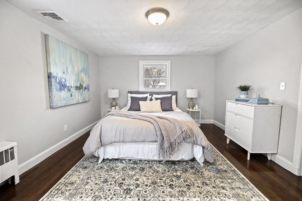 40 Como Road Boston, MA 02136 - Photo 15 of 31 a bedroom with a large bed and a window