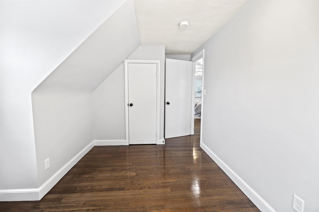 40 Como Road Boston, MA 02136 - Photo 19 of 31 a view of an empty room with wooden floor