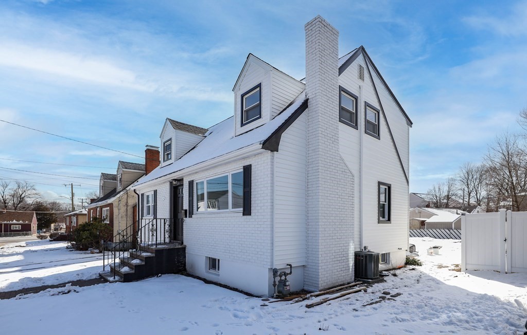 40 Como Road Boston, MA 02136 - Photo 24 of 31 a view of a house with many windows