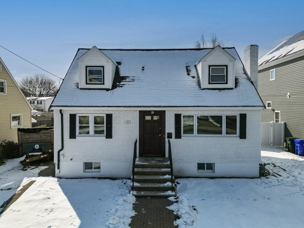 40 Como Road Boston, MA 02136 - Photo 27 of 31 a front view of a house with a yard