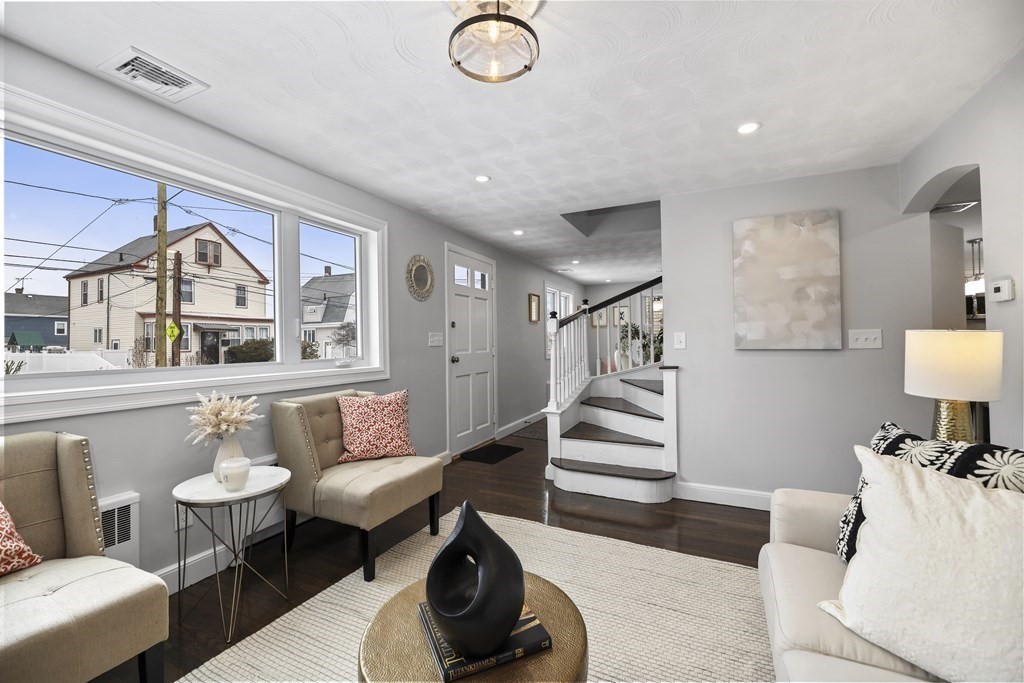 40 Como Road Boston, MA 02136 - Photo 4 of 31 a living room with furniture and a wooden floor