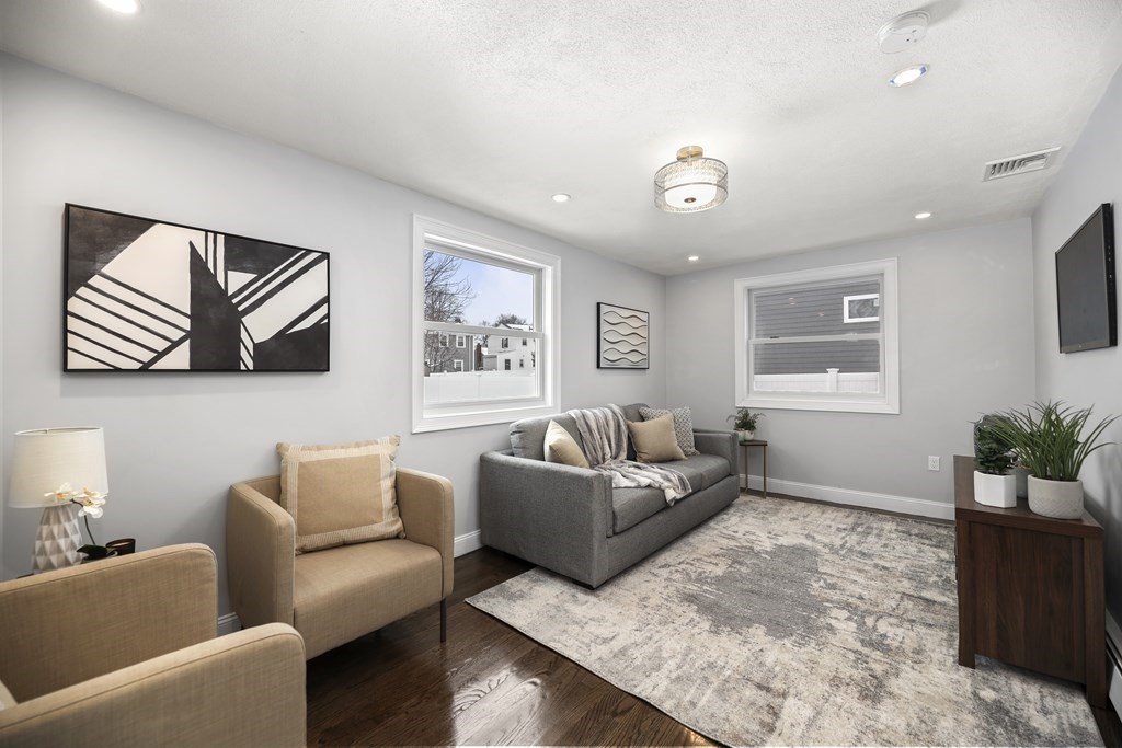 40 Como Road Boston, MA 02136 - Photo 9 of 31 a living room with furniture and a window