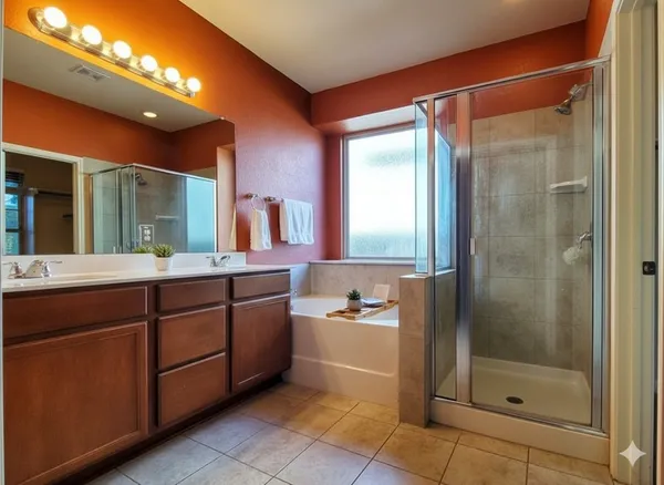 a bathroom view of a toilet and a shower