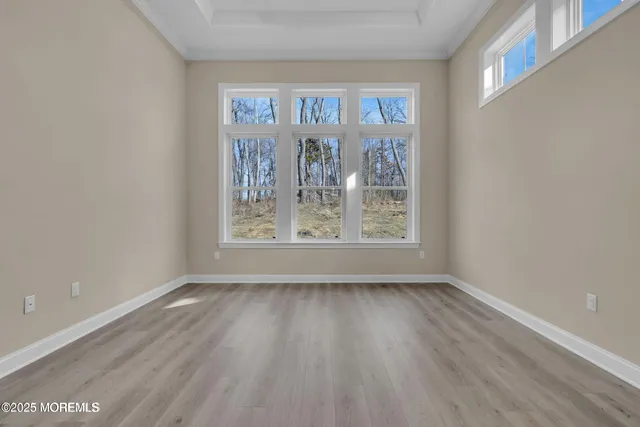 a view of a wooden floor in a room