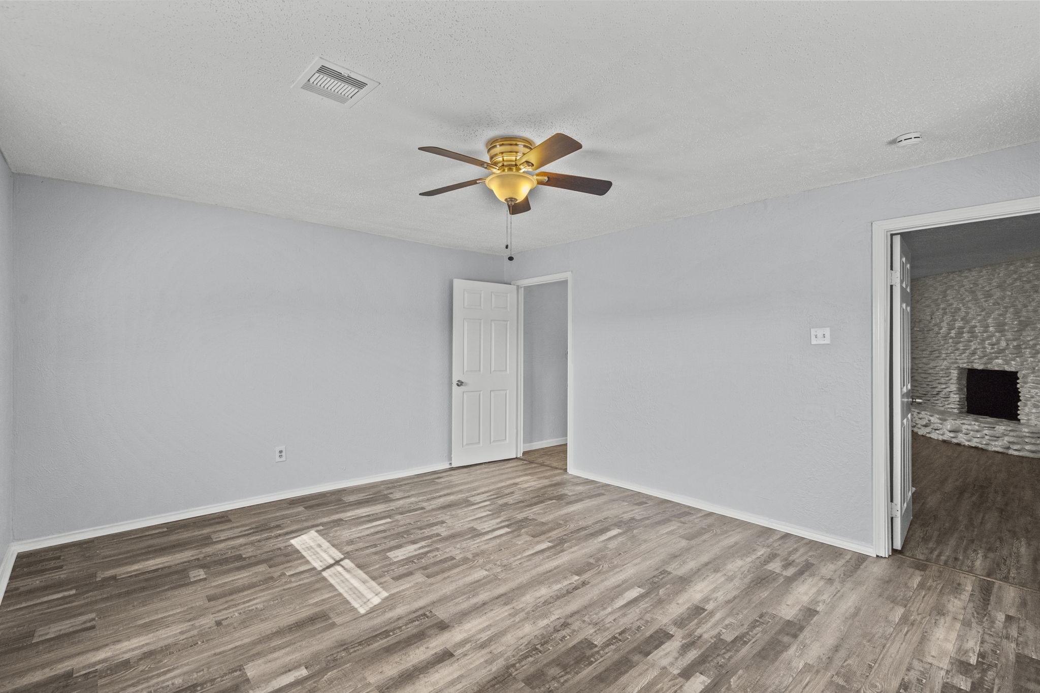 228 Orange Street La Marque, TX 77568 - Photo 17 of 21 a view of a kitchen with a sink and a chandelier fan