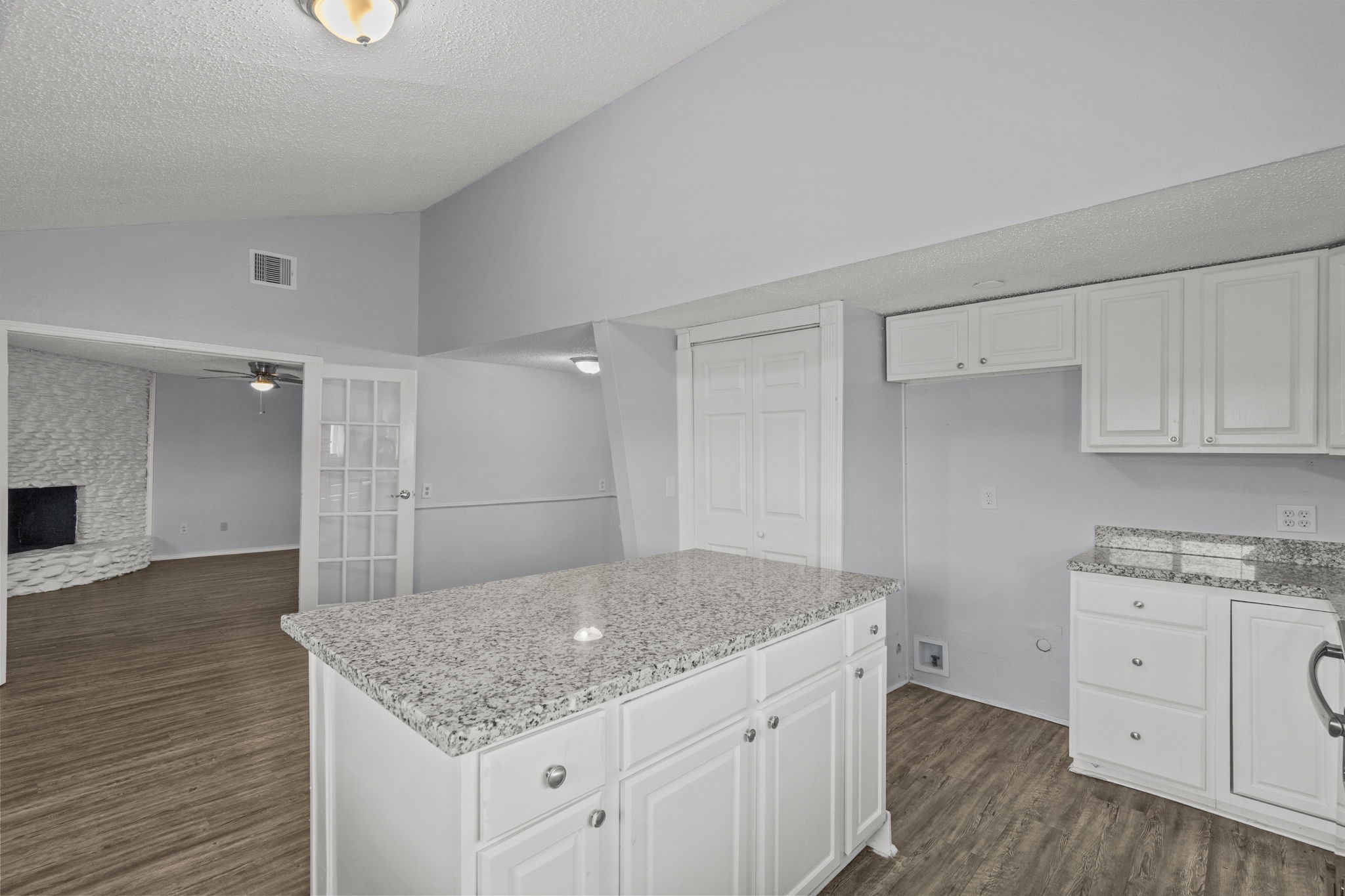 228 Orange Street La Marque, TX 77568 - Photo 7 of 21 a kitchen with a sink cabinets and wooden floor