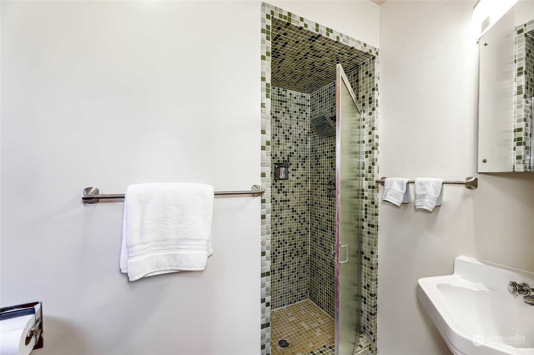 8724 Fauntlee Crest Southwest Seattle, WA 98136 - Photo 20 of 33 a bathroom with a shower