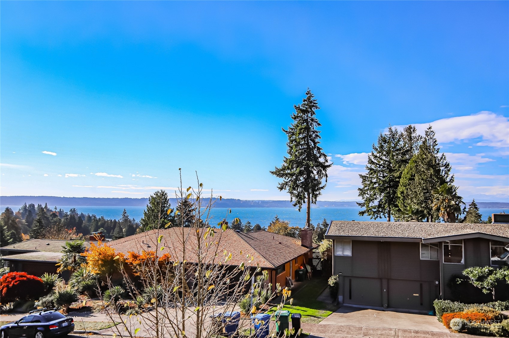 8724 Fauntlee Crest Southwest Seattle, WA 98136 - Photo 3 of 33 a view of a house with a outdoor space