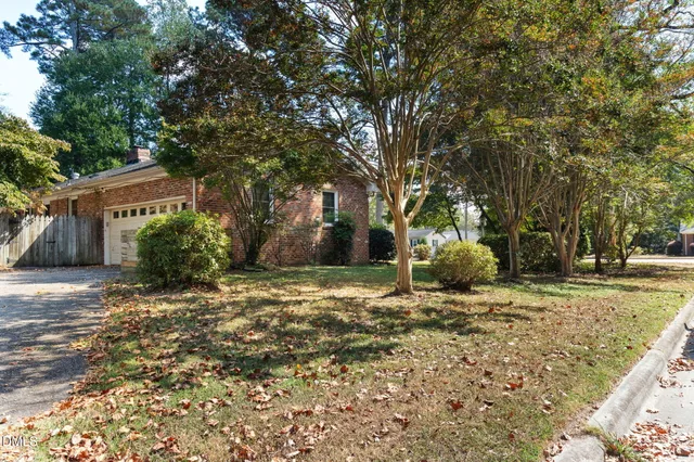 a backyard of a house with lots of green space