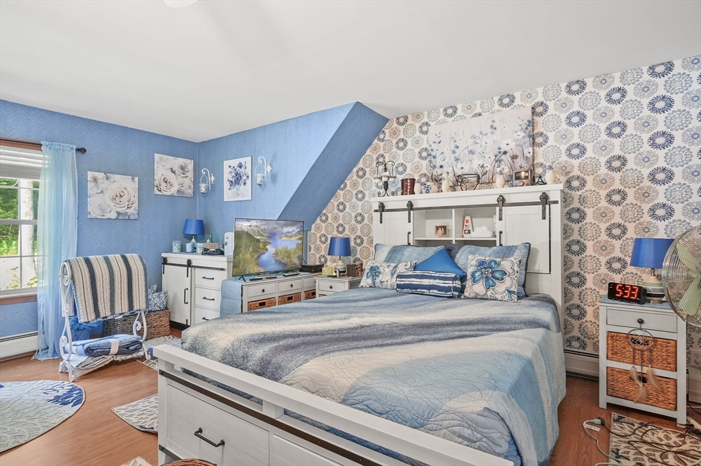 3 Newton Street Barre, MA 01005 - Photo 11 of 39 a bedroom with a bed and a couch