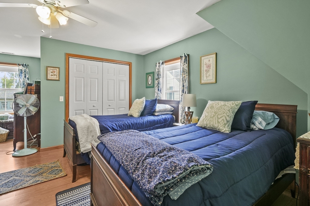 3 Newton Street Barre, MA 01005 - Photo 14 of 39 a bedroom with a bed and wooden floor