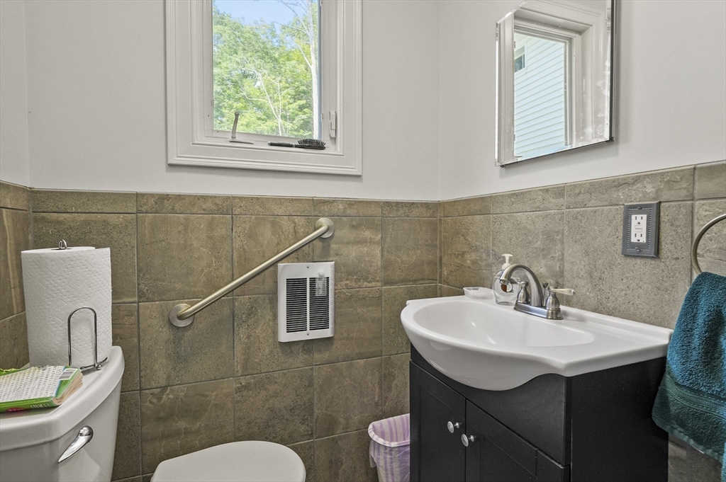 3 Newton Street Barre, MA 01005 - Photo 24 of 39 a bathroom with a sink mirror and toilet
