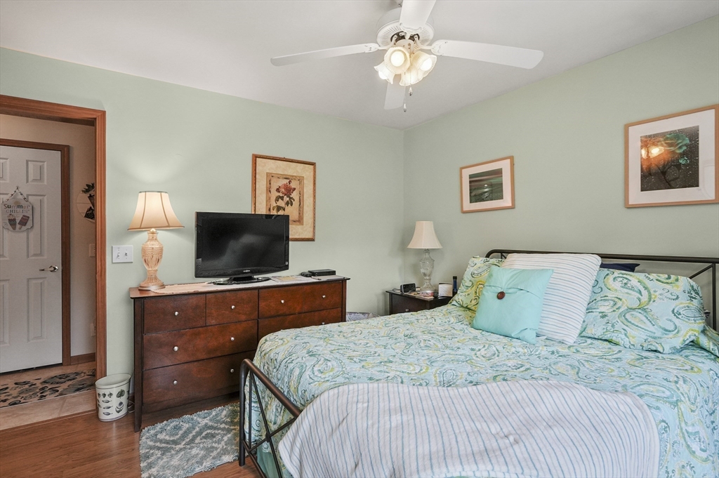 3 Newton Street Barre, MA 01005 - Photo 9 of 39 a bedroom with a bed and a flat screen tv