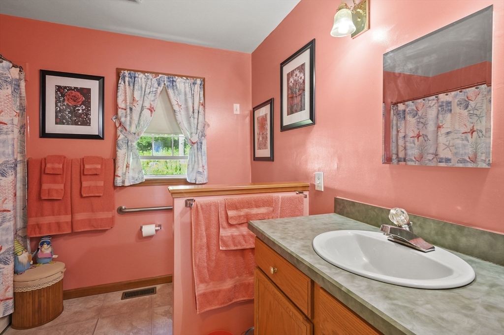 3 Newton Street Barre, MA 01005 - Photo 10 of 39 a bathroom with a granite countertop sink and a mirror