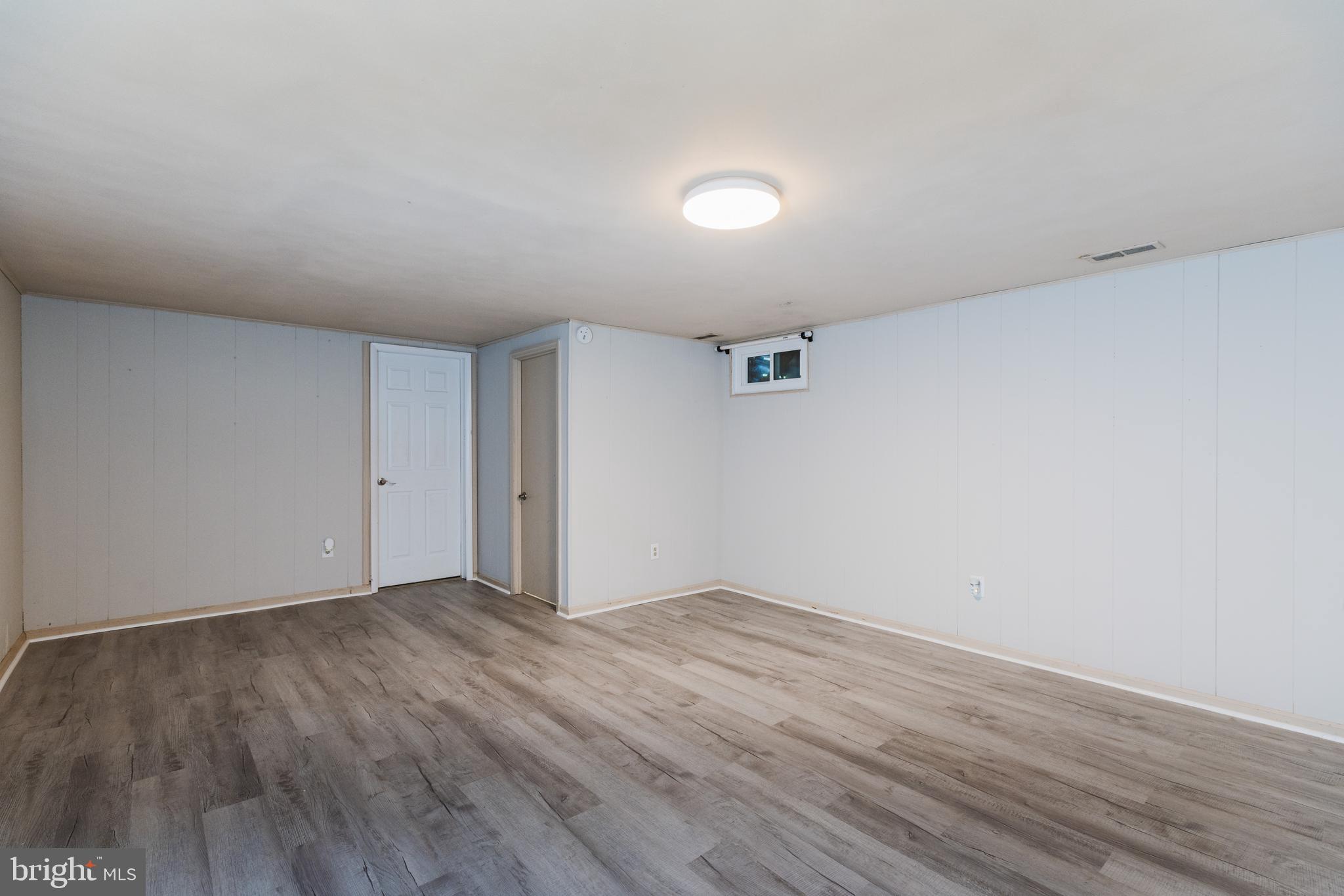 37 Millbrook Road Newark, DE 19713 - Photo 31 of 49 a view of an empty room with wooden floor