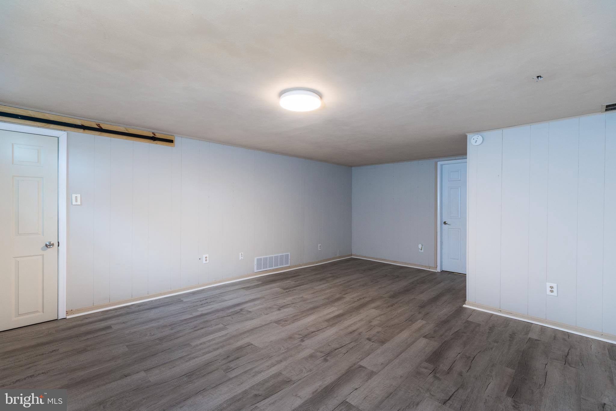 37 Millbrook Road Newark, DE 19713 - Photo 32 of 49 a view of an empty room with wooden floor