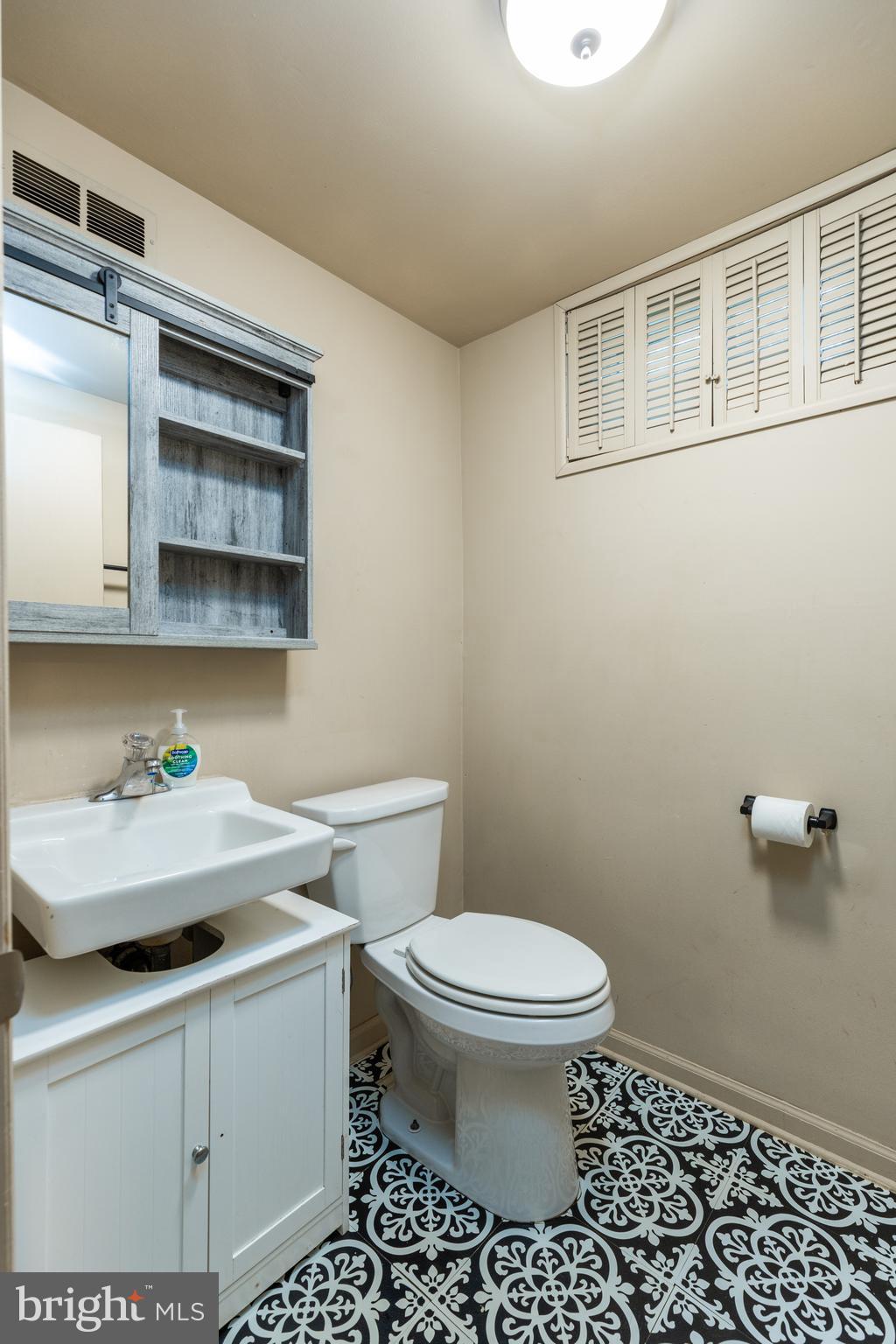 37 Millbrook Road Newark, DE 19713 - Photo 34 of 49 a bathroom with a sink a toilet and vanity