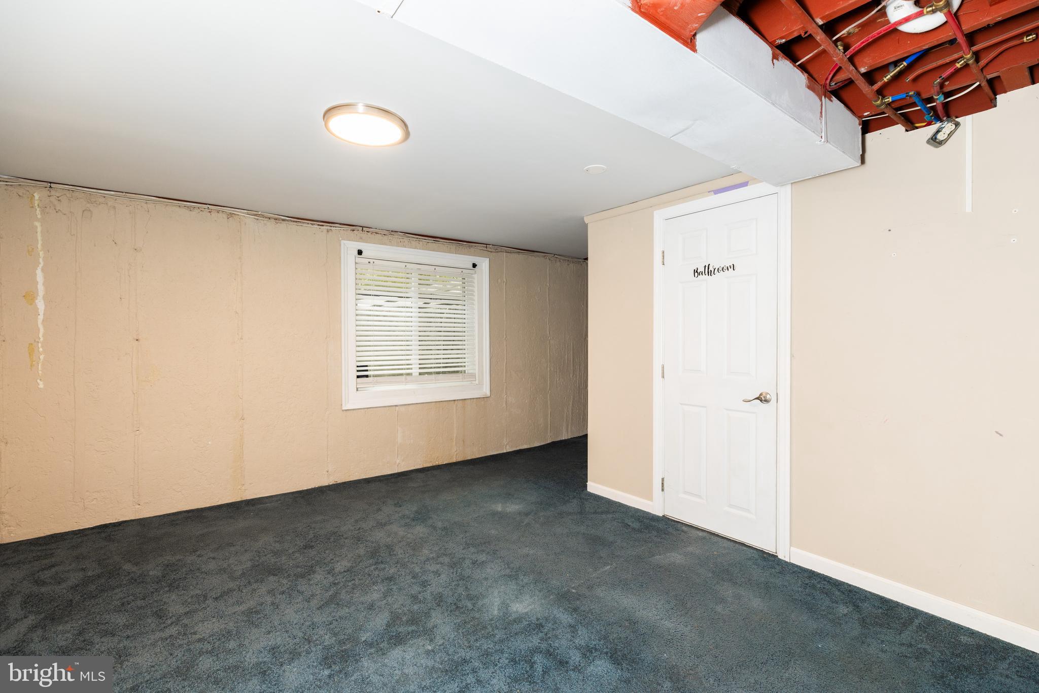 37 Millbrook Road Newark, DE 19713 - Photo 38 of 49 an empty room with a window