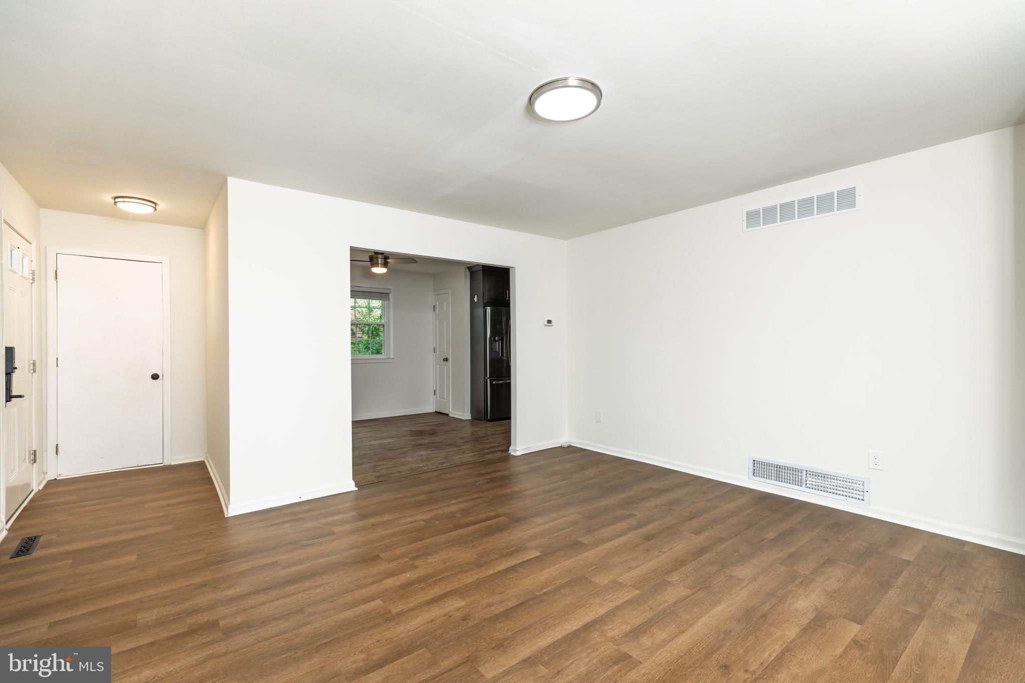 37 Millbrook Road Newark, DE 19713 - Photo 4 of 49 a view of an empty room with wooden floor