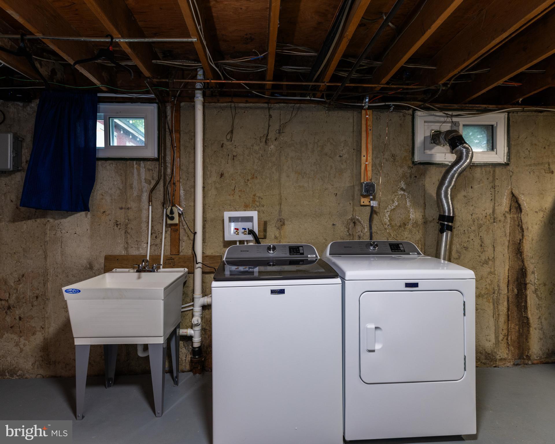 37 Millbrook Road Newark, DE 19713 - Photo 43 of 49 a utility room with dryer and washer