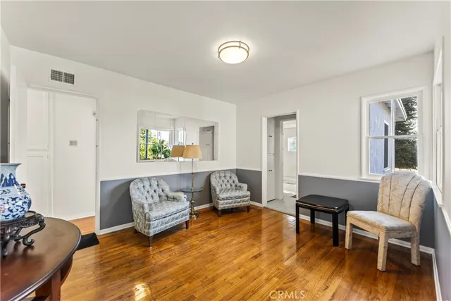 a living room with furniture and window