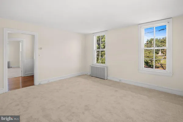 an empty room with windows