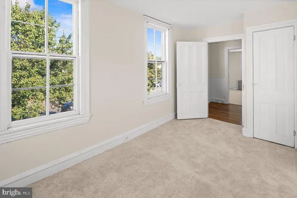 an empty room with windows
