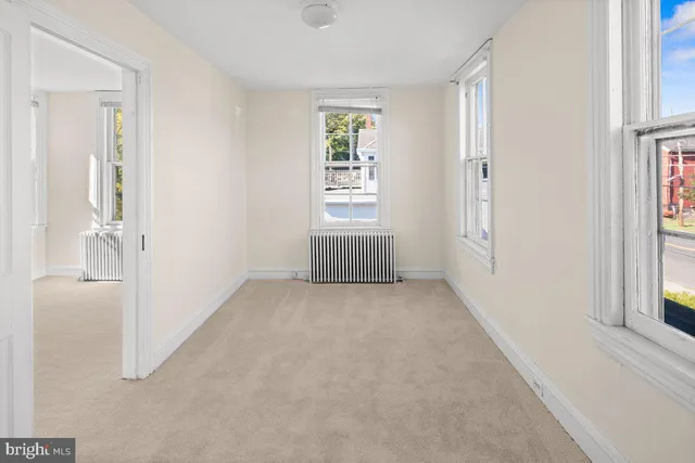 an empty room with windows