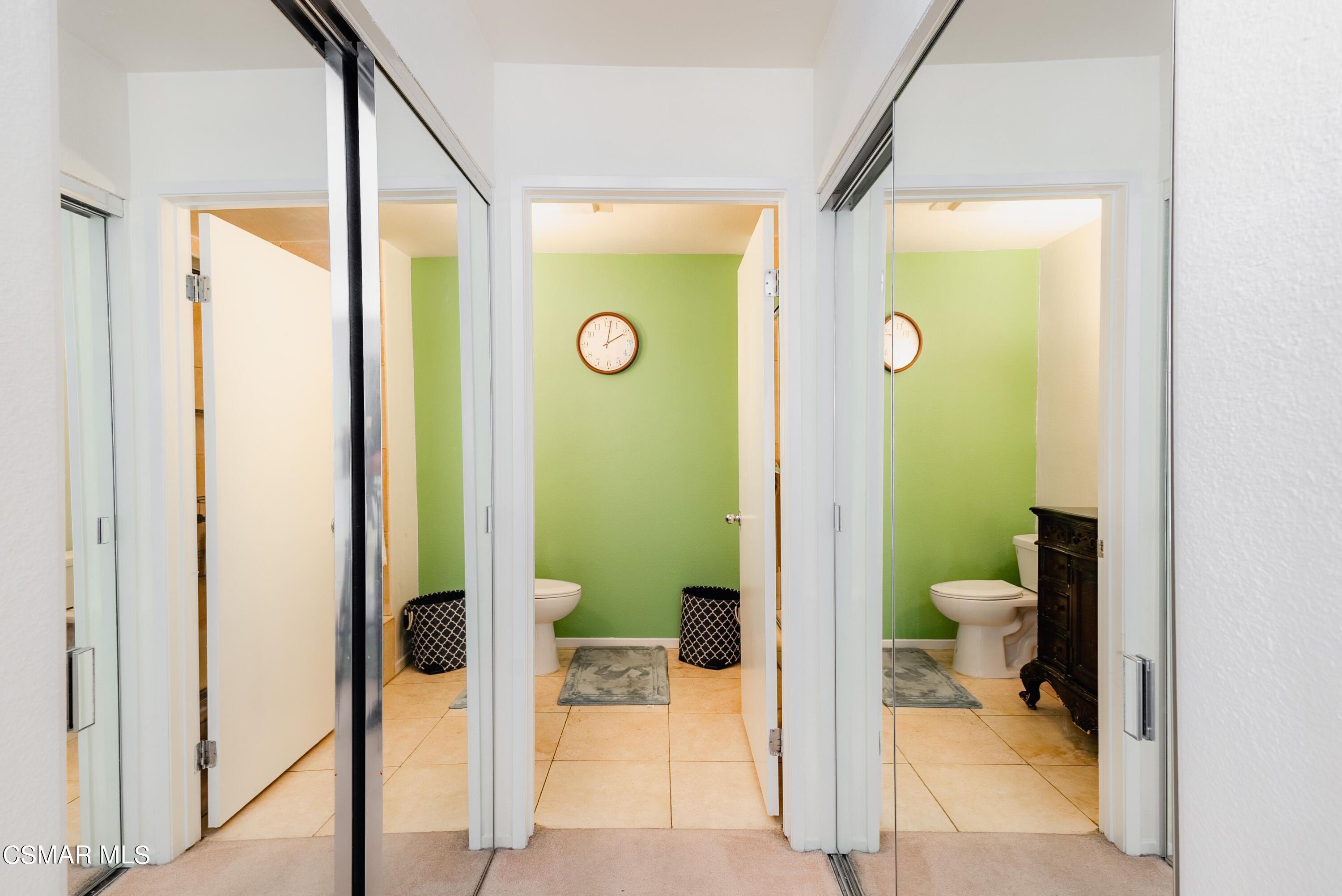 20253 Keswick Street, Unit 233 Winnetka, CA 91306 - Photo 7 of 18 a bathroom with a tub and shower view